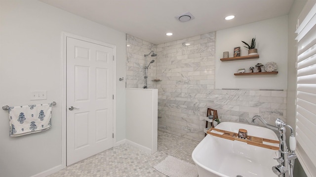 bathroom featuring separate shower and tub, tile walls, and sink