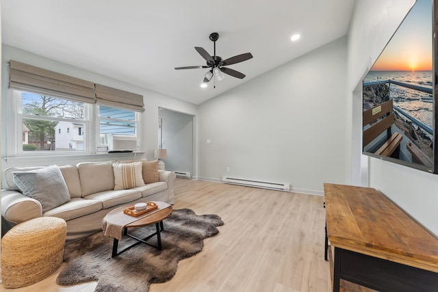 living area featuring light wood-style floors, a baseboard radiator, baseboards, and vaulted ceiling