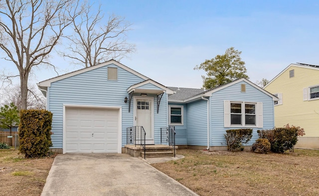 ranch-style home with a garage, concrete driveway, and roof with shingles