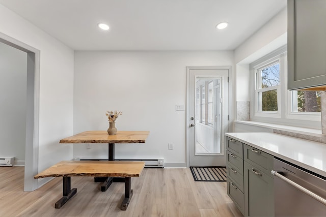 interior space featuring light wood-style flooring, baseboards, and recessed lighting