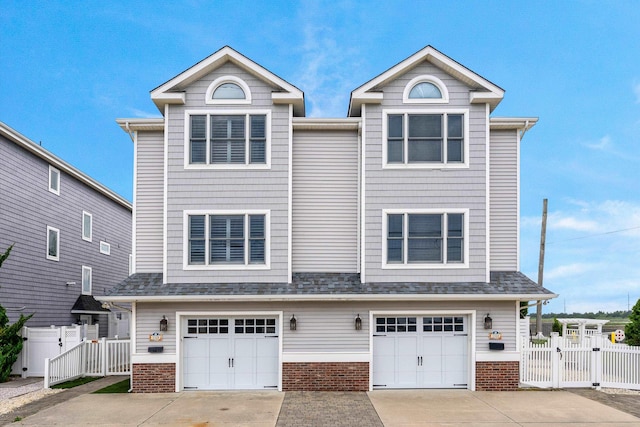3328 Ocean Dr Unit 3328, Avalon, NJ 08202 - multi unit property with a gate, driveway, and brick siding