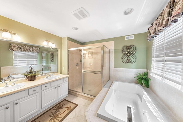 3328 Ocean Dr Unit 3328, Avalon, NJ 08202 - full bath featuring tile patterned flooring, a stall shower, double vanity, and a bath
