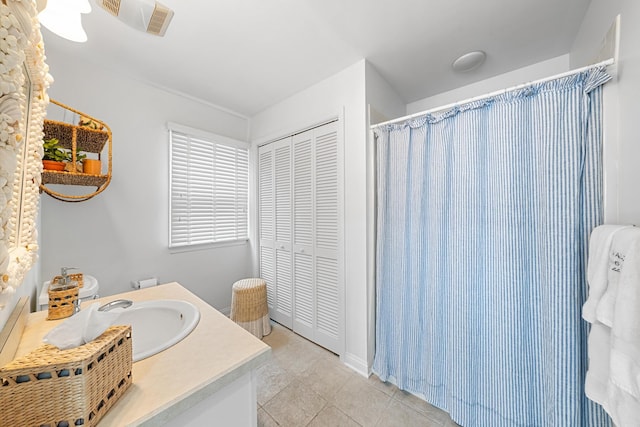 3328 Ocean Dr Unit 3328, Avalon, NJ 08202 - bathroom with vanity, a closet, tile patterned floors, and a shower with shower curtain