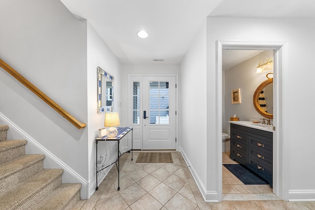 3328 Ocean Dr Unit 3328, Avalon, NJ 08202 - entrance foyer featuring light tile patterned floors and stairway