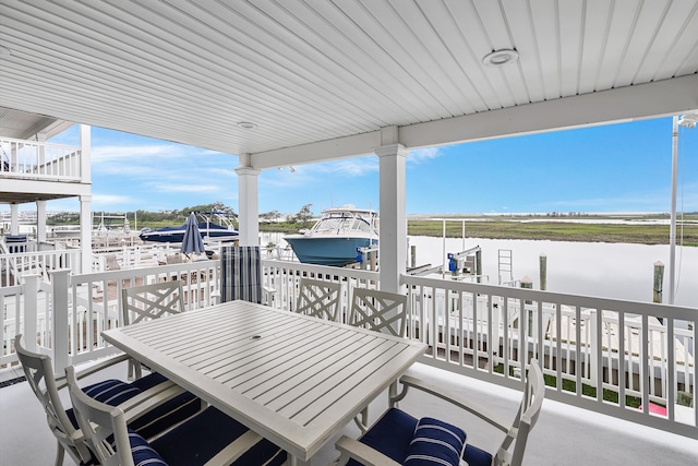 3328 Ocean Dr Unit 3328, Avalon, NJ 08202 - view of patio featuring boat lift, a water view, and a boat dock