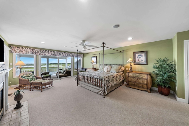 3328 Ocean Dr Unit 3328, Avalon, NJ 08202 - bedroom with carpet floors, access to exterior, a fireplace, a ceiling fan, and recessed lighting
