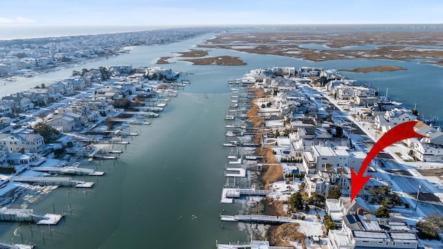 drone / aerial view featuring a water view