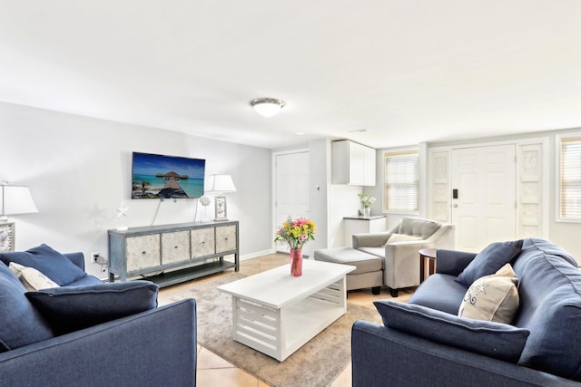 living room featuring baseboards