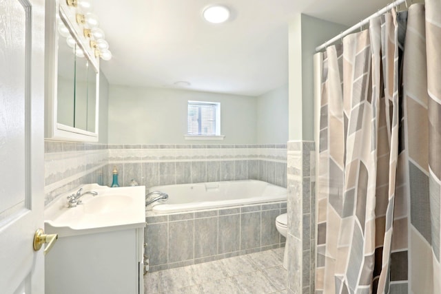 full bathroom featuring a garden tub, a shower with curtain, and vanity