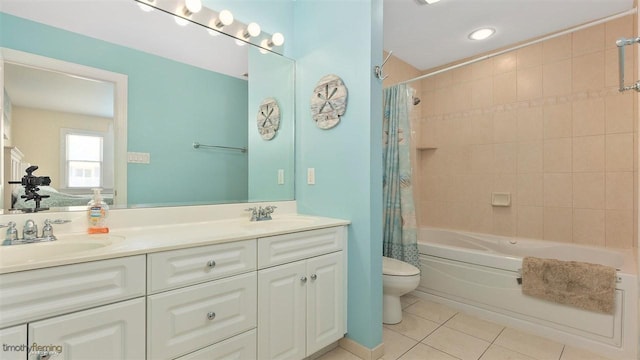 full bathroom featuring tile patterned flooring, vanity, shower / bath combination with curtain, and toilet