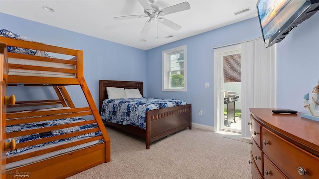 bedroom featuring ceiling fan and light colored carpet