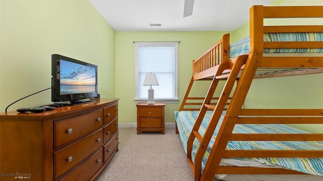 bedroom with light carpet