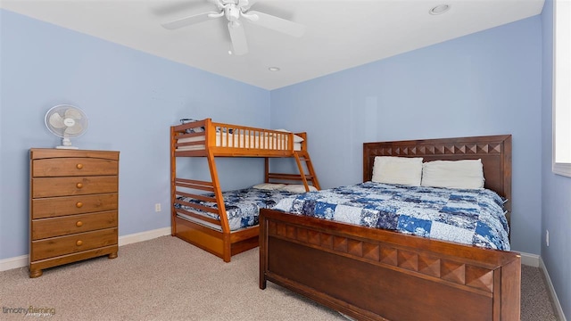 bedroom with light carpet and ceiling fan