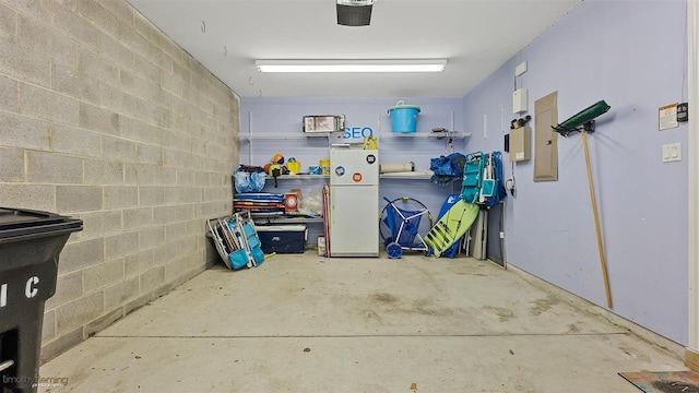 garage featuring white refrigerator