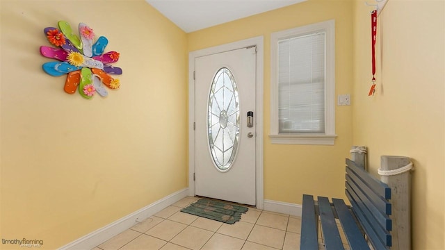 entrance foyer with light tile patterned floors