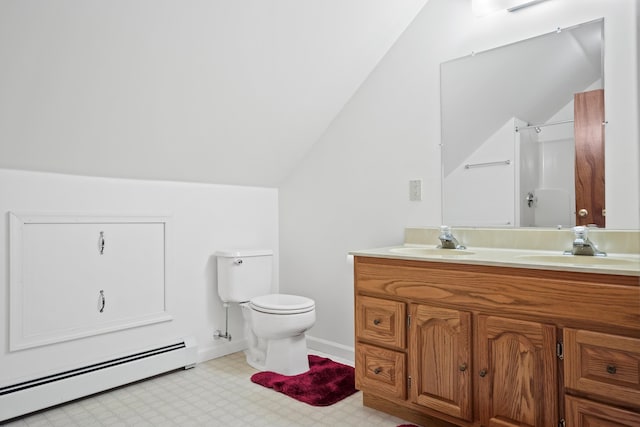 bathroom with vanity, vaulted ceiling, toilet, baseboard heating, and walk in shower