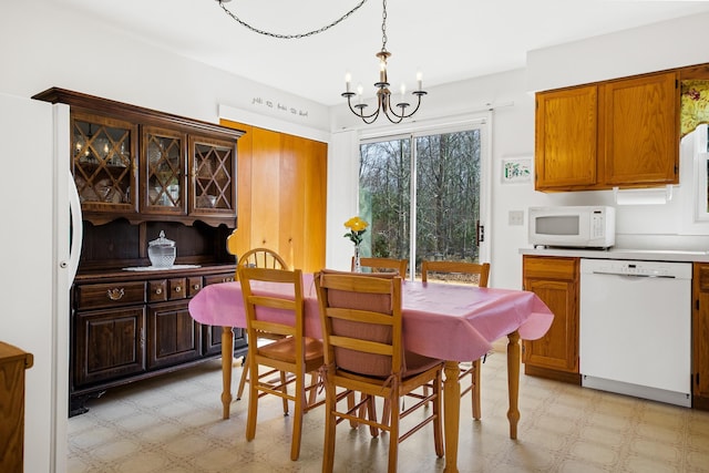 dining room featuring an inviting chandelier