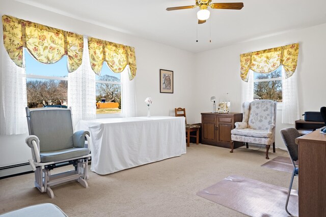 bedroom with carpet flooring, multiple windows, and ceiling fan