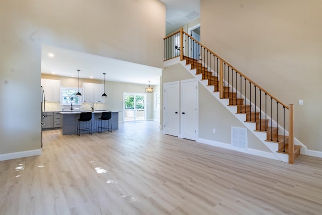 unfurnished living room featuring light hardwood / wood-style flooring