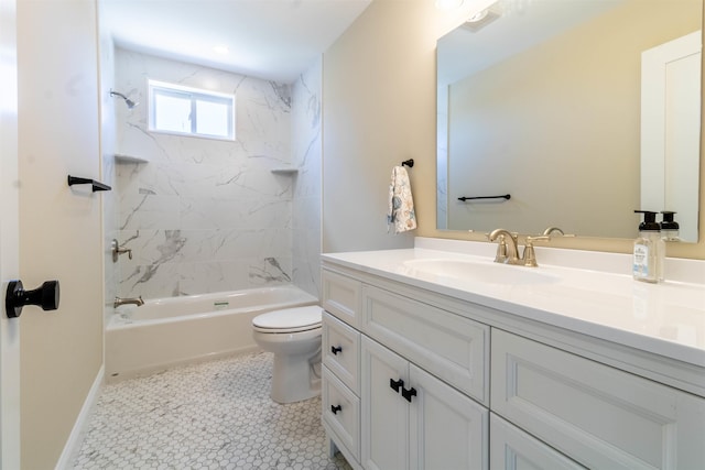 full bathroom with tile patterned floors, vanity, tiled shower / bath combo, and toilet