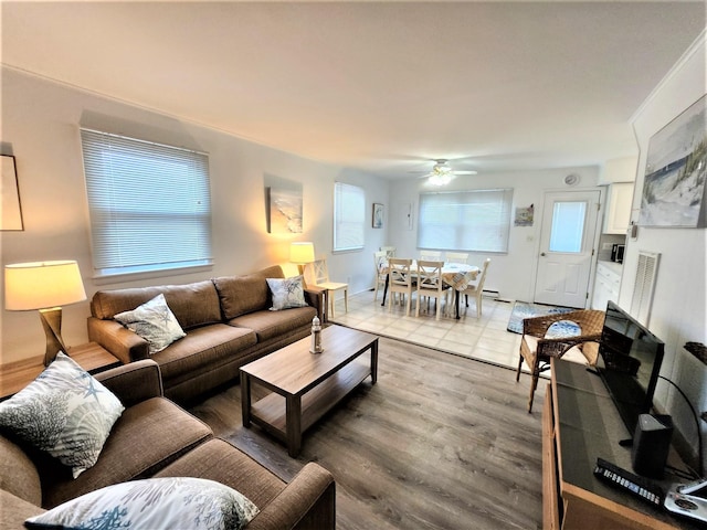 9903 2nd Ave, Stone Harbor, NJ 08247 - living room featuring a ceiling fan and light wood-style floors