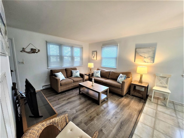 9903 2nd Ave, Stone Harbor, NJ 08247 - living area featuring a baseboard heating unit and wood finished floors