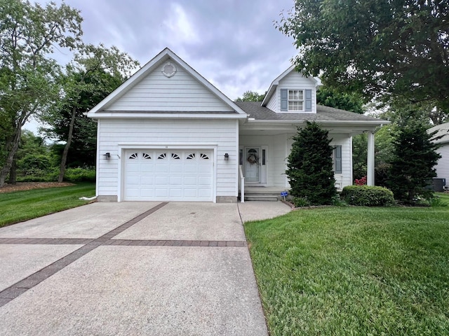 48 Wynndemere Ct, Cape May Court House, NJ 08210 - view of front of house with concrete driveway, a front lawn, an attached garage, and a shingled roof
