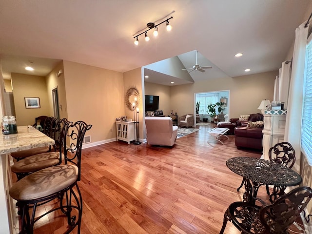 48 Wynndemere Ct, Cape May Court House, NJ 08210 - living area featuring light wood-style floors, baseboards, ceiling fan, vaulted ceiling, and recessed lighting