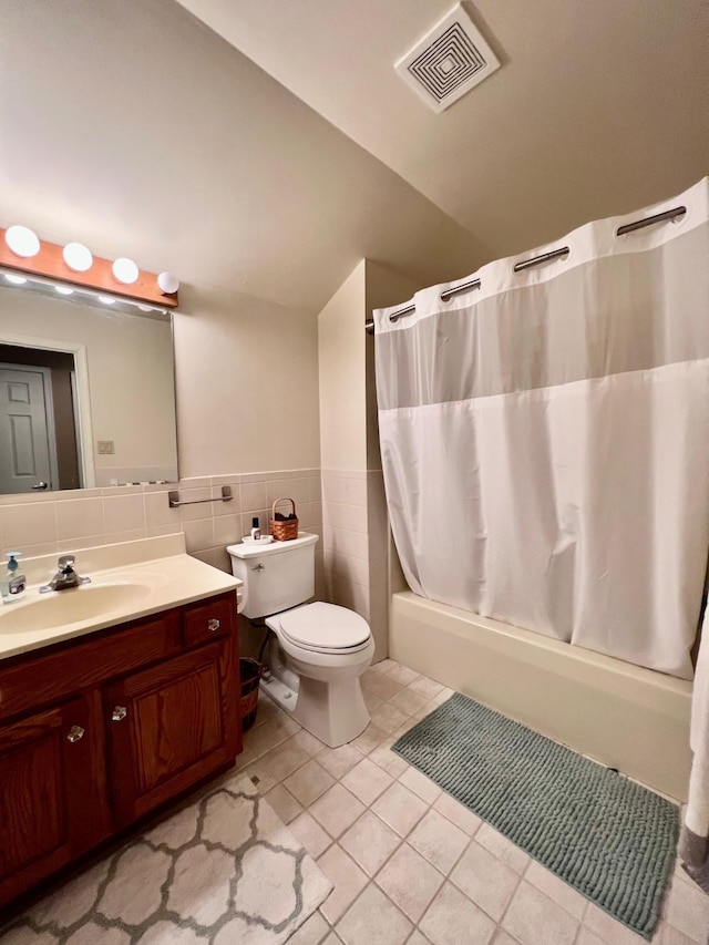 48 Wynndemere Ct, Cape May Court House, NJ 08210 - bathroom featuring tile patterned flooring, shower / bathtub combination with curtain, toilet, vanity, and lofted ceiling