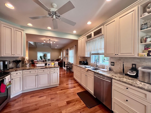 48 Wynndemere Ct, Cape May Court House, NJ 08210 - kitchen featuring appliances with stainless steel finishes, a sink, ceiling fan, light wood finished floors, and tasteful backsplash