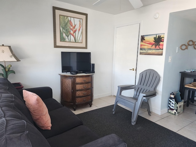 living room with ceiling fan and light tile patterned floors