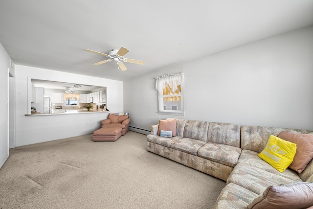 28 89th St, Sea Isle City, NJ 08243 - living room with carpet flooring, ceiling fan, and a baseboard radiator