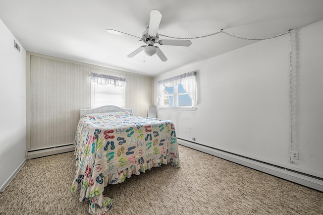 28 89th St, Sea Isle City, NJ 08243 - bedroom with a baseboard heating unit, carpet, and a ceiling fan