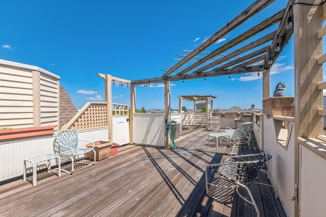 wooden terrace featuring a pergola