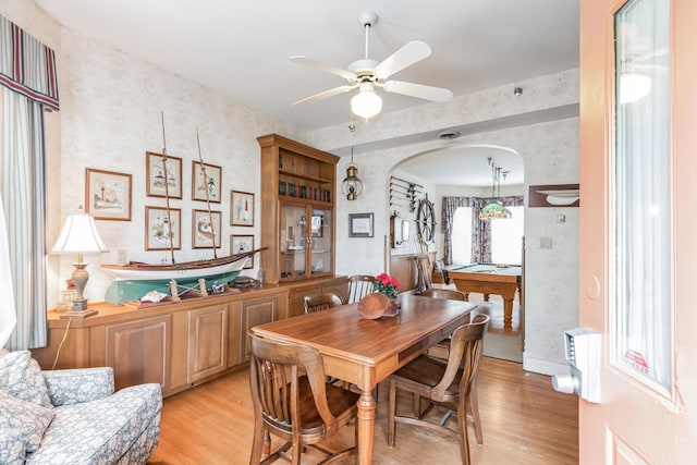 dining area with light hardwood / wood-style flooring, ceiling fan, and pool table