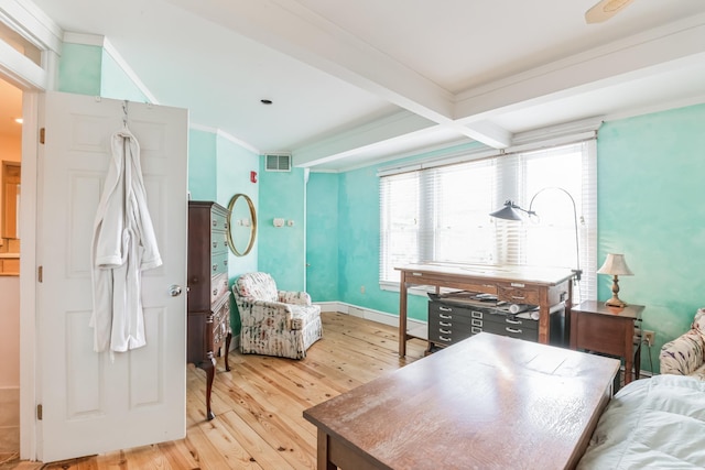 interior space with beamed ceiling and hardwood / wood-style floors