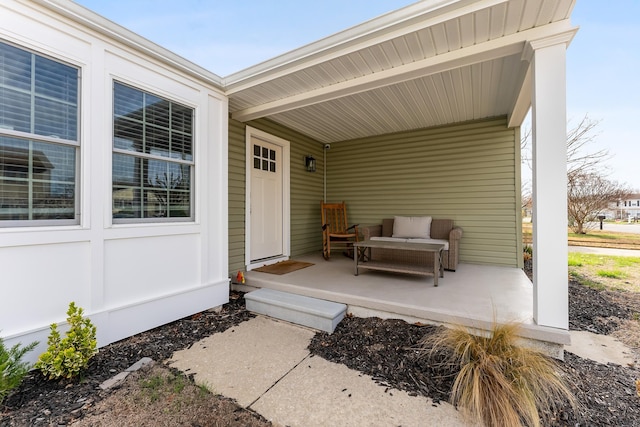 entrance to property with a porch