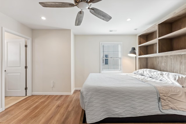 bedroom with baseboards, visible vents, recessed lighting, and light wood finished floors