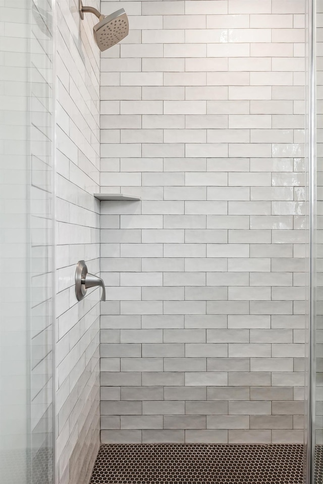 full bathroom featuring a stall shower
