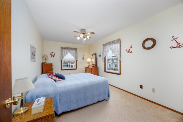 bedroom featuring carpet flooring and ceiling fan