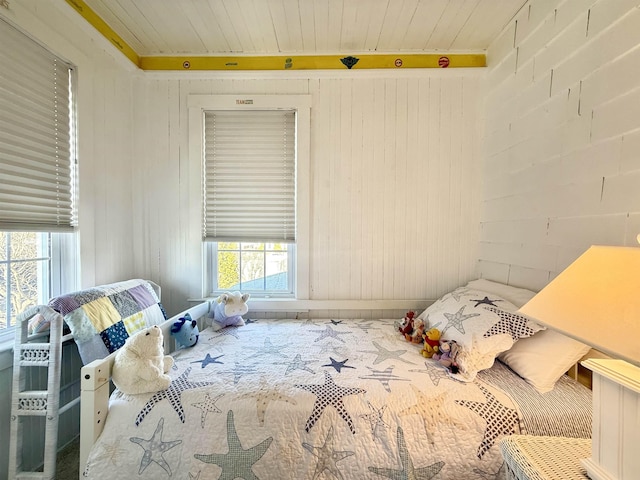168 98th St, Stone Harbor, NJ 08247 - bedroom with wooden ceiling and wood walls