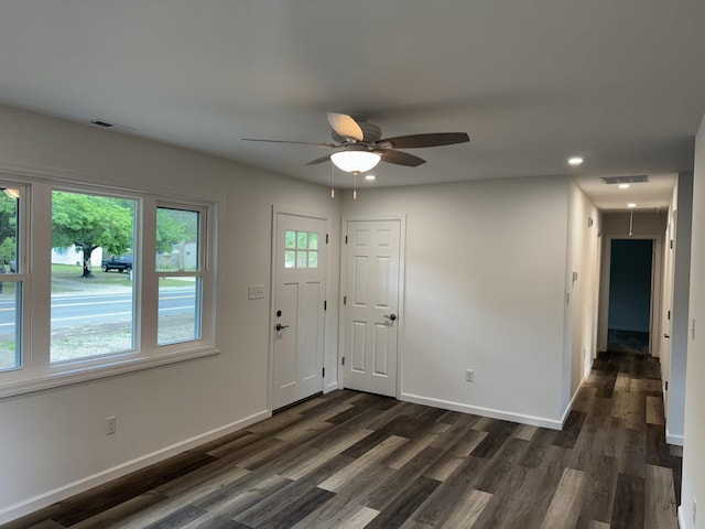 entrance foyer with dark wood-type flooring, a ceiling fan, recessed lighting, and baseboards