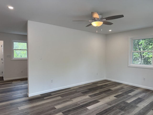 unfurnished room with dark wood-style floors, ceiling fan, plenty of natural light, and recessed lighting