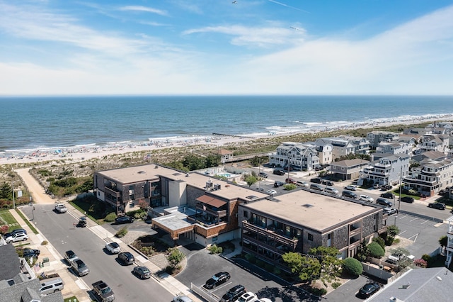 aerial view featuring a beach view and a water view