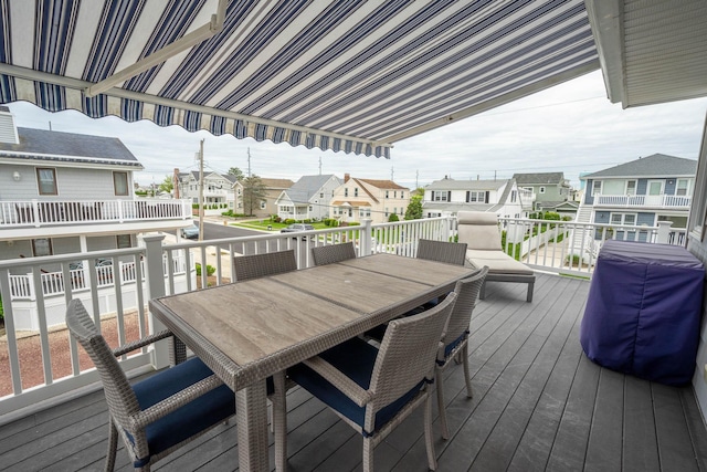 254 89th St Unit 1, Stone Harbor, NJ 08247 - wooden deck with outdoor dining area and a residential view