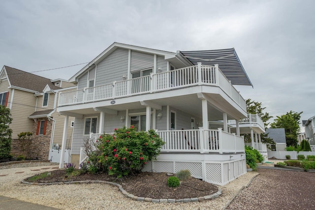254 89th St Unit 1, Stone Harbor, NJ 08247 - view of front of house with covered porch and a balcony