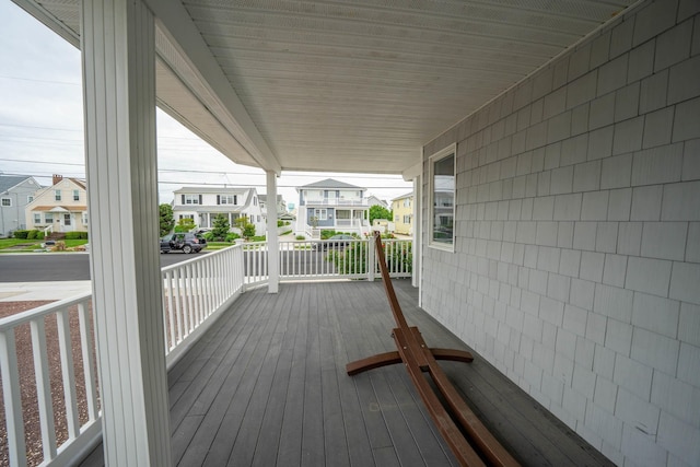 254 89th St Unit 1, Stone Harbor, NJ 08247 - wooden porch featuring a residential view