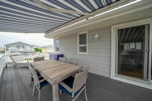 254 89th St Unit 1, Stone Harbor, NJ 08247 - wooden terrace featuring outdoor dining area and a residential view