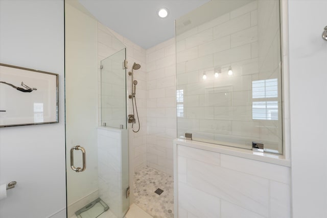 bathroom with an enclosed shower