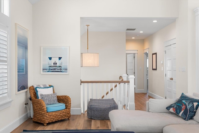 living room with a healthy amount of sunlight and light wood-type flooring